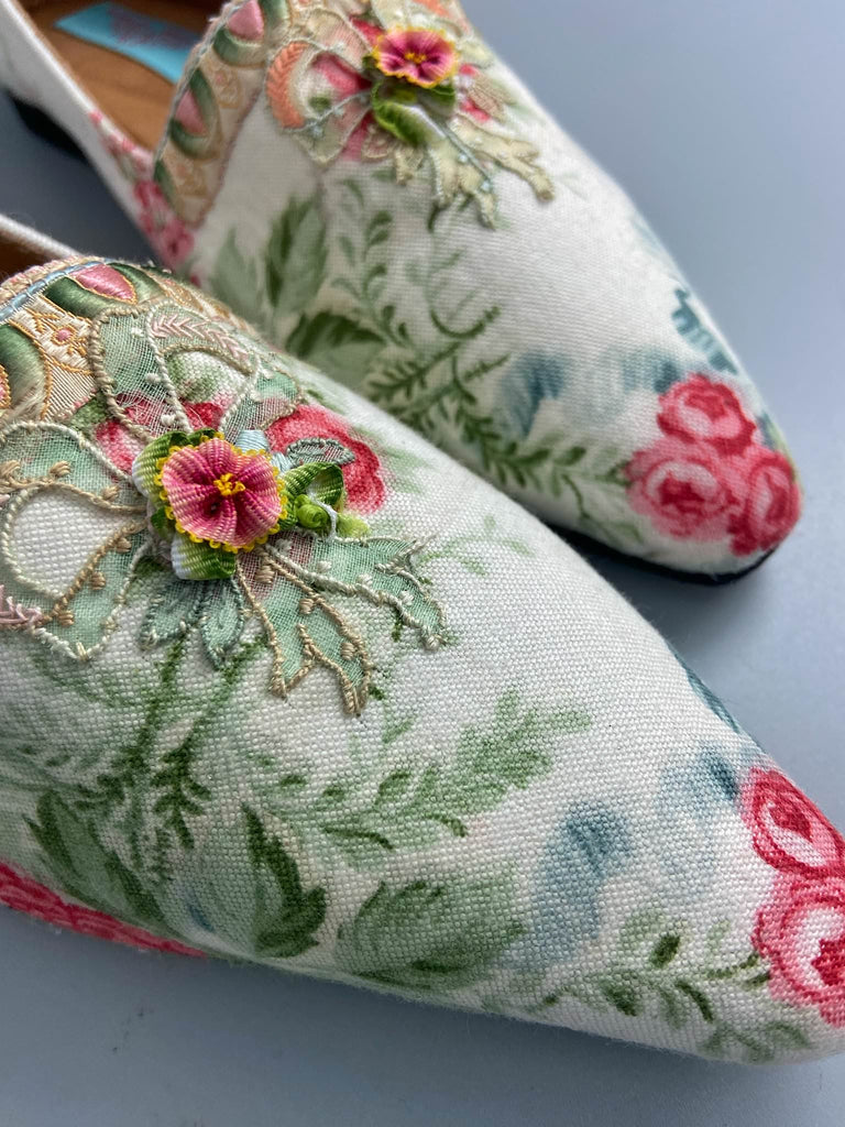 Rosebud toile pointed toe Regency dancing slippers with antique silk appliqué bows and ankle ribbons. Bohemian style created from antique and vintage textiles by Pavilion Parade.