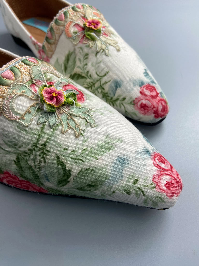 Rosebud toile pointed toe Regency dancing slippers with antique silk appliqué bows and ankle ribbons. Bohemian style created from antique and vintage textiles by Pavilion Parade.