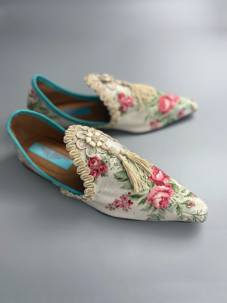 Rosebud toile pointed toe shoes with antique silk tassel appliqué rosettes and passementerie braid. Bohemian style created from antique and vintage textiles by Pavilion Parade.