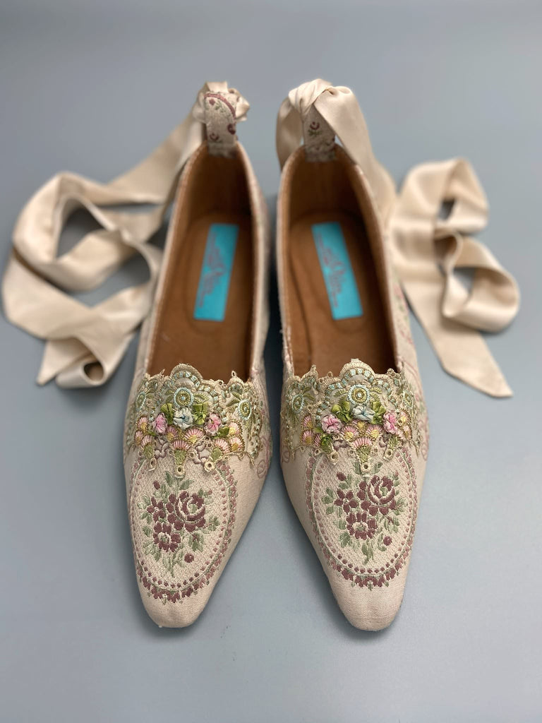 Ivory and lavender silk and linen rose cartouche Regency dancing slippers. Sustainably created from antique textiles and embellishments by the Pavilion Parade studio
