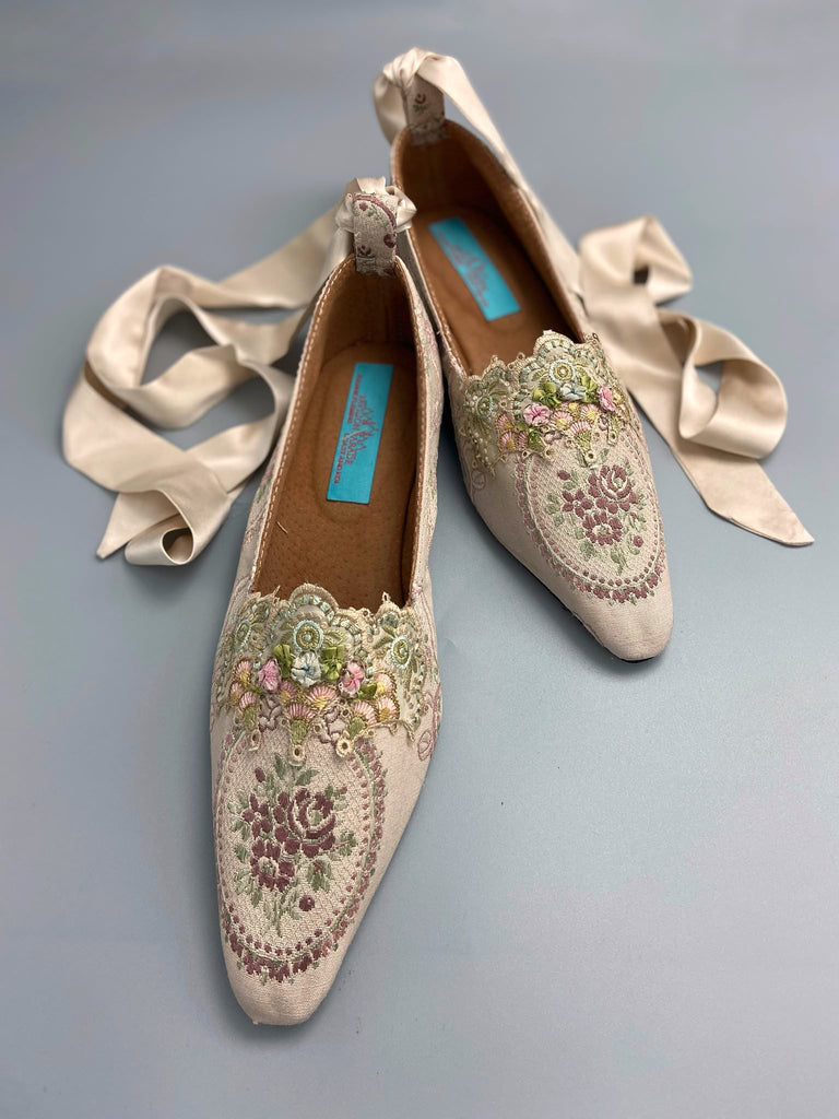 Ivory and lavender silk and linen rose cartouche Regency dancing slippers. Sustainably created from antique textiles and embellishments by the Pavilion Parade studio
