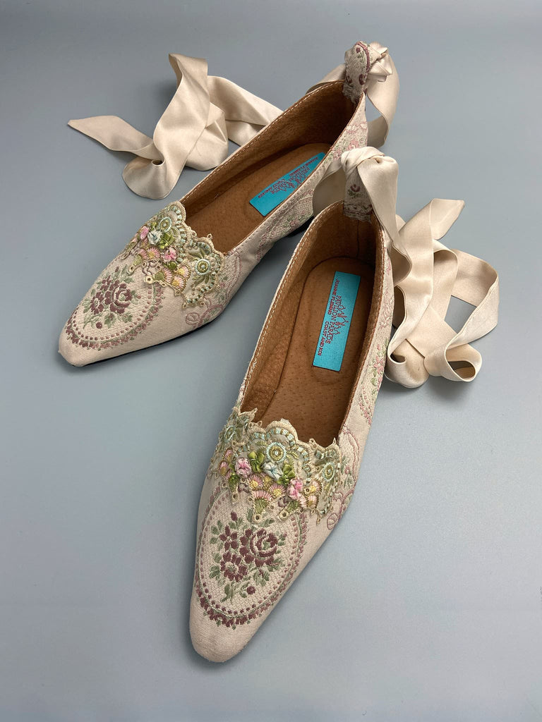 Ivory and lavender silk and linen rose cartouche Regency dancing slippers. Sustainably created from antique textiles and embellishments by the Pavilion Parade studio