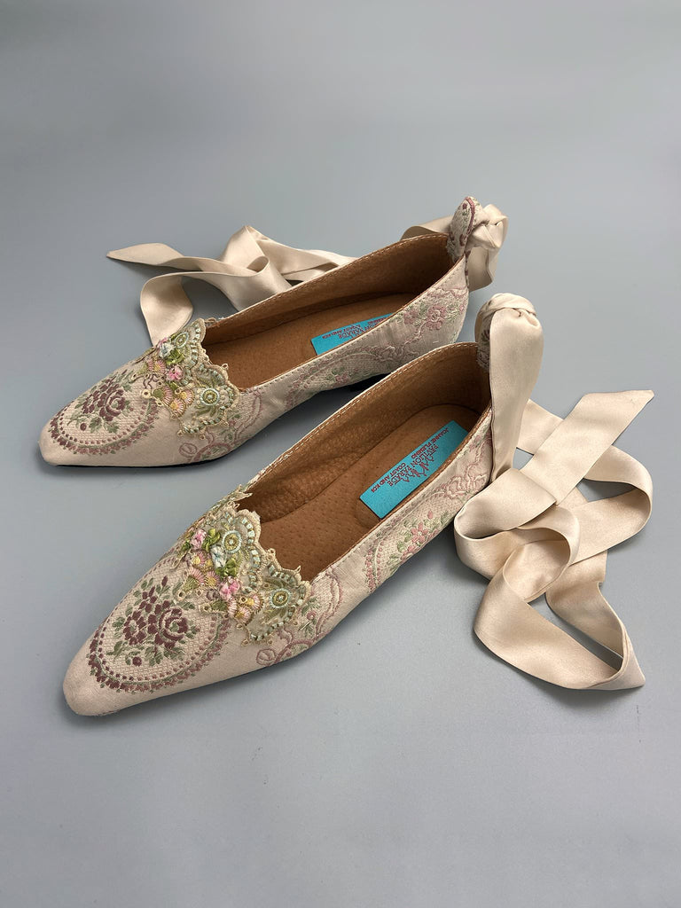 Ivory and lavender silk and linen rose cartouche Regency dancing slippers. Sustainably created from antique textiles and embellishments by the Pavilion Parade studio