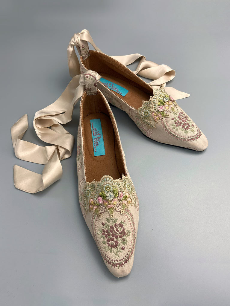 Ivory and lavender silk and linen rose cartouche Regency dancing slippers. Sustainably created from antique textiles and embellishments by the Pavilion Parade studio