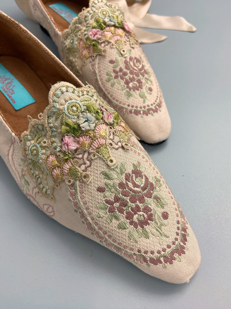 Ivory and lavender silk and linen rose cartouche Regency dancing slippers. Sustainably created from antique textiles and embellishments by the Pavilion Parade studio