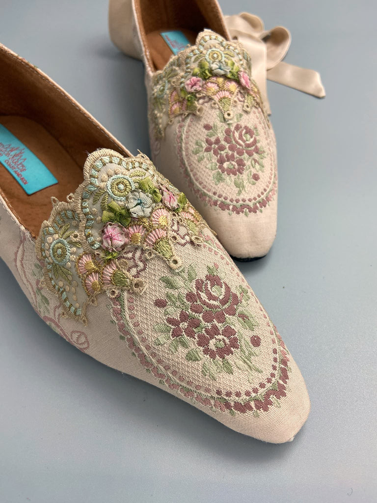Ivory and lavender silk and linen rose cartouche Regency dancing slippers. Sustainably created from antique textiles and embellishments by the Pavilion Parade studio