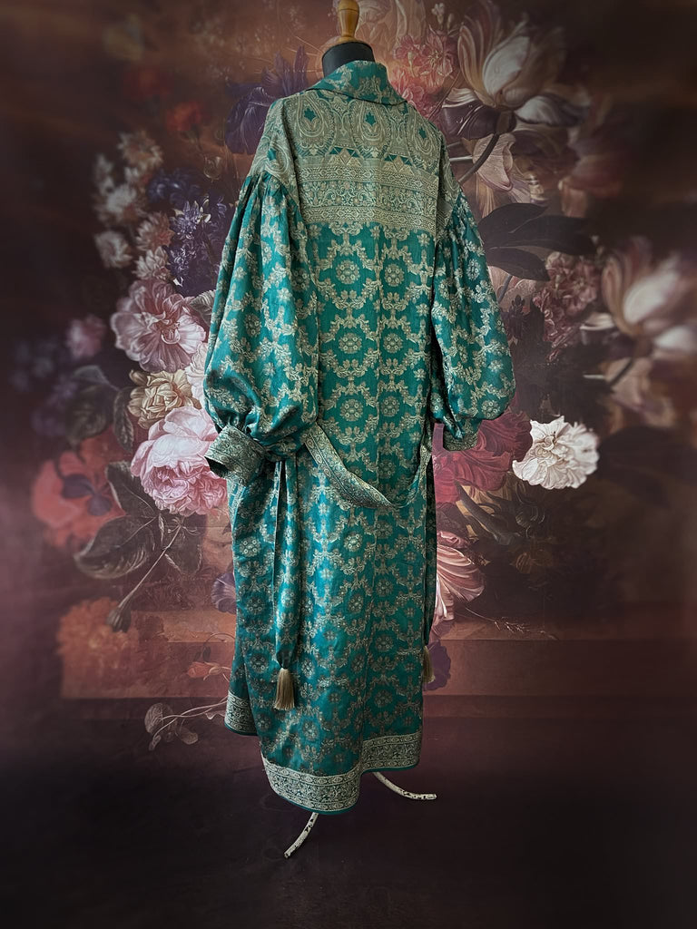 Jade green lightweight silk wrapper robe with full sleeves, large patch pockets and tassel sash. Bohemian style sustainably created from antique and vintage textiles by the Pavilion Parade studio.