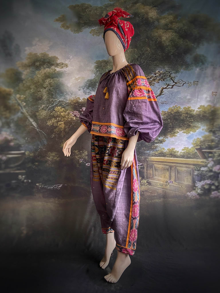 Lavender, mustard yellow, and teal fine cotton Ikat beach pyjamas with full sleeved drawstring neckline blouse and drawstring Ottoman harem pants. Bohemian styles created from  vintage and antique textiles by the Pavilion Parade studio