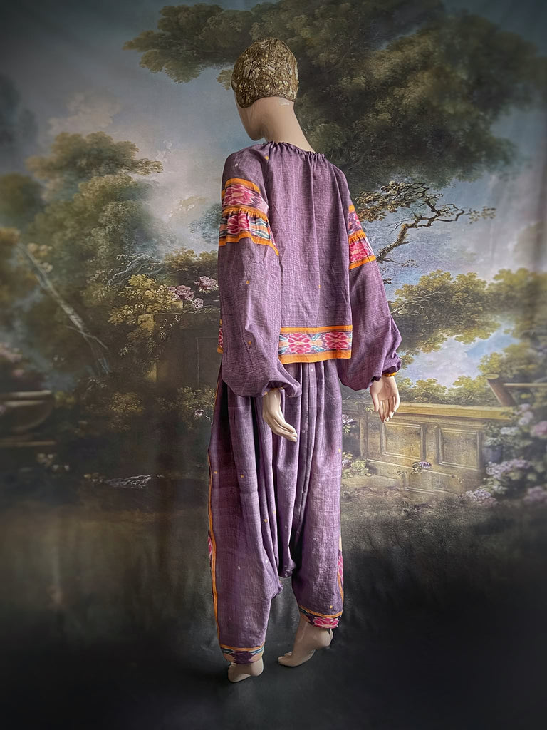 Lavender, mustard yellow, and teal fine cotton Ikat beach pyjamas with full sleeved drawstring neckline blouse and drawstring Ottoman harem pants. Bohemian styles created from  vintage and antique textiles by the Pavilion Parade studio