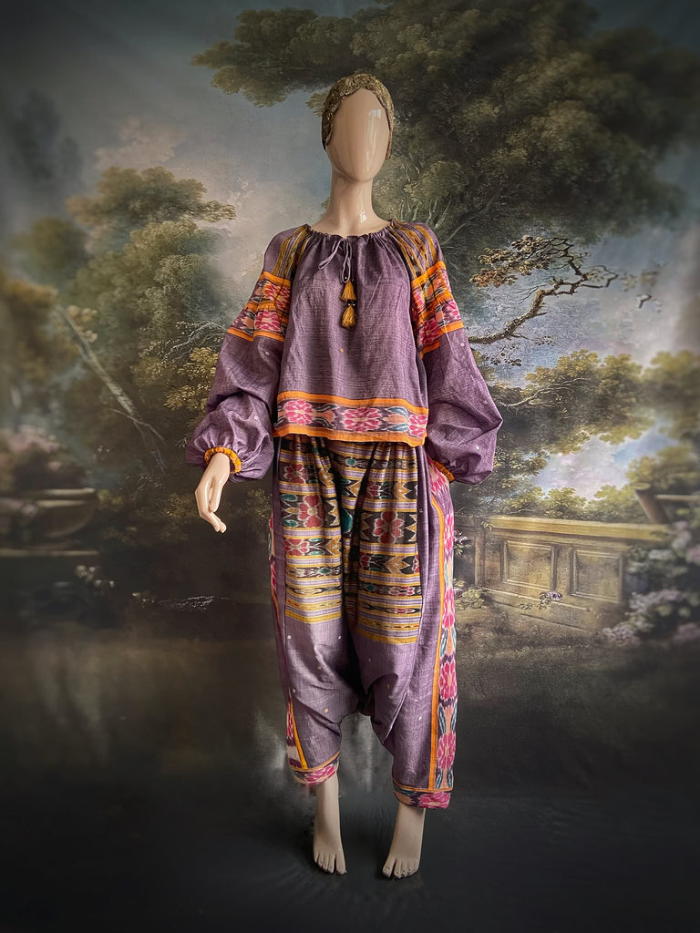 Lavender, mustard yellow, and teal fine cotton Ikat beach pyjamas with full sleeved drawstring neckline blouse and drawstring Ottoman harem pants. Bohemian styles created from  vintage and antique textiles by the Pavilion Parade studio