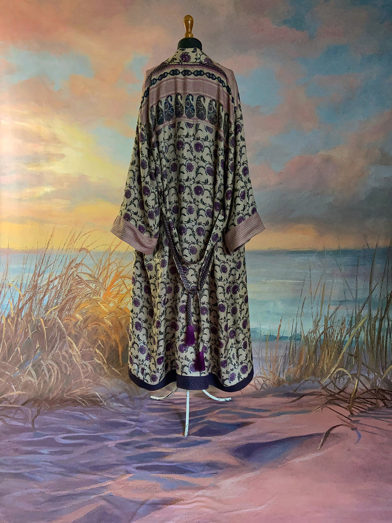 Pale lavender and lilac fine wool robe with silk lining. Wide sleeves, pockets , and tassel sash. Sustainably created from antique and vintage textiles by the Pavilion Parade studio