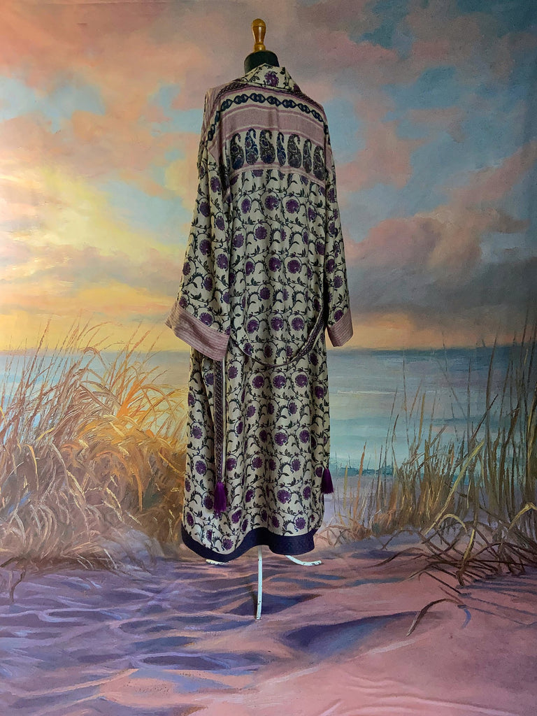 Pale lavender and lilac fine wool robe with silk lining. Wide sleeves, pockets , and tassel sash. Sustainably created from antique and vintage textiles by the Pavilion Parade studio