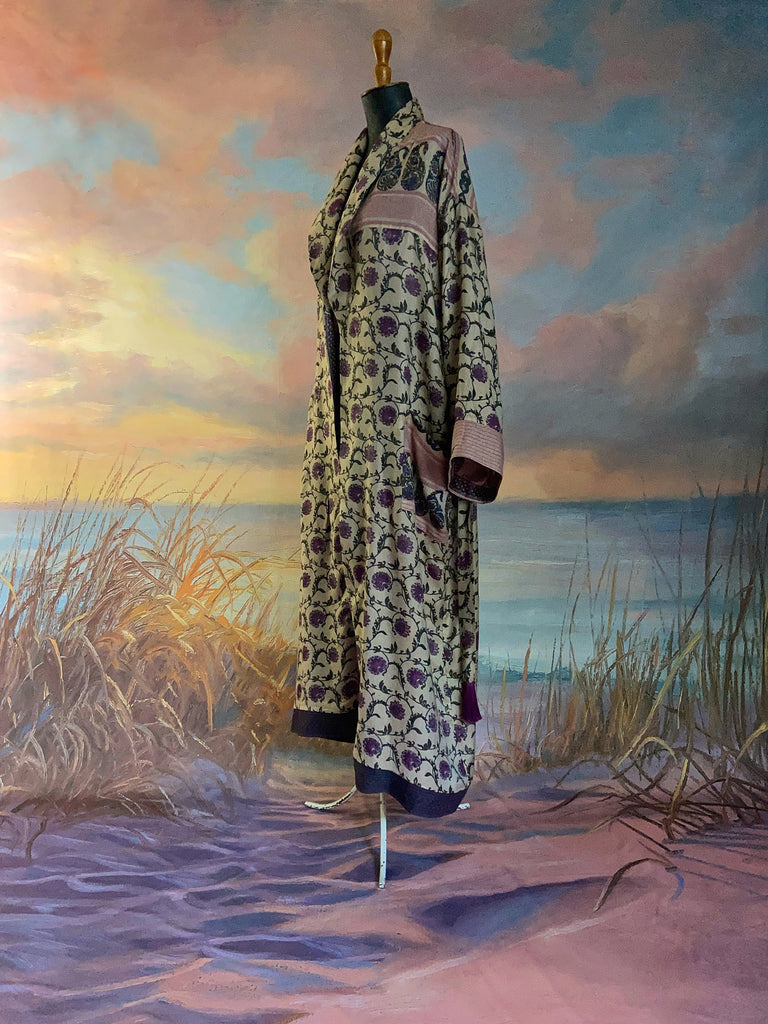 Pale lavender and lilac fine wool robe with silk lining. Wide sleeves, pockets , and tassel sash. Sustainably created from antique and vintage textiles by the Pavilion Parade studio