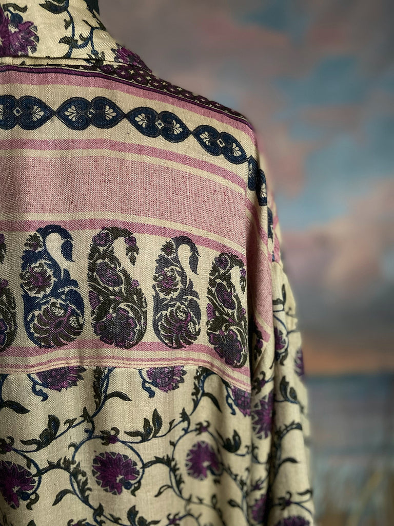 Pale lavender and lilac fine wool robe with silk lining. Wide sleeves, pockets , and tassel sash. Sustainably created from antique and vintage textiles by the Pavilion Parade studio