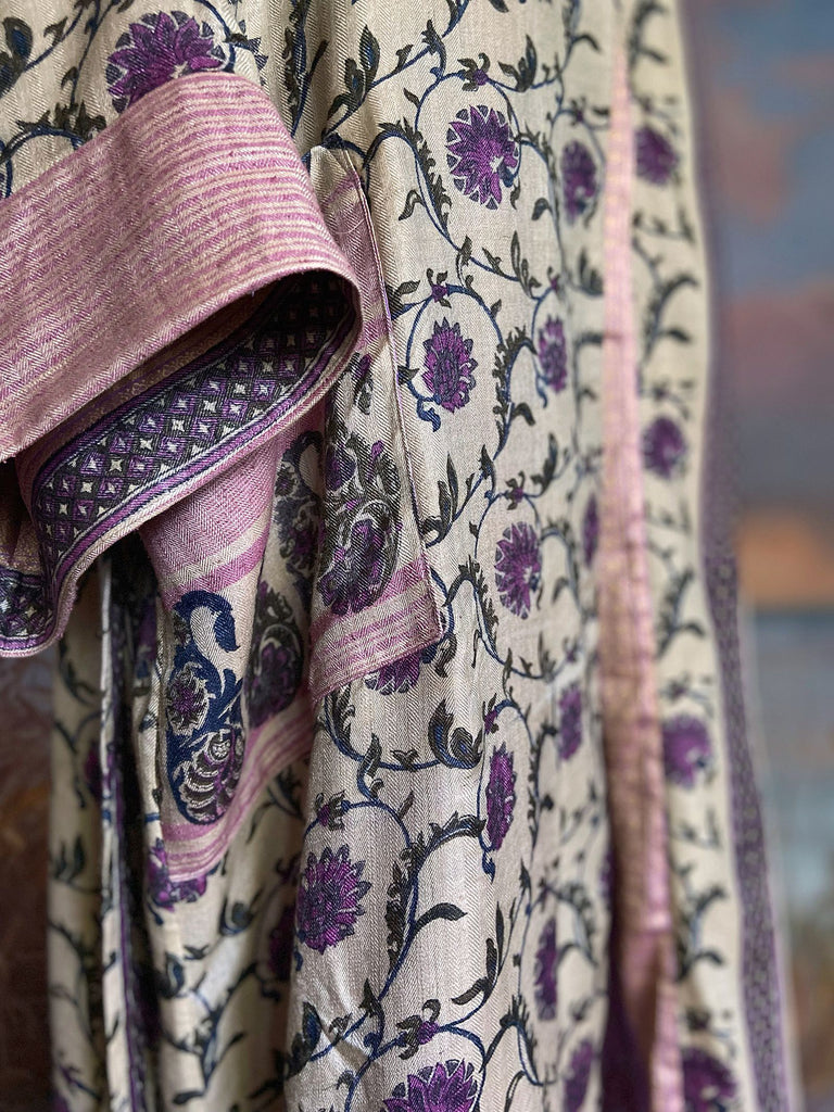 Pale lavender and lilac fine wool robe with silk lining. Wide sleeves, pockets , and tassel sash. Sustainably created from antique and vintage textiles by the Pavilion Parade studio