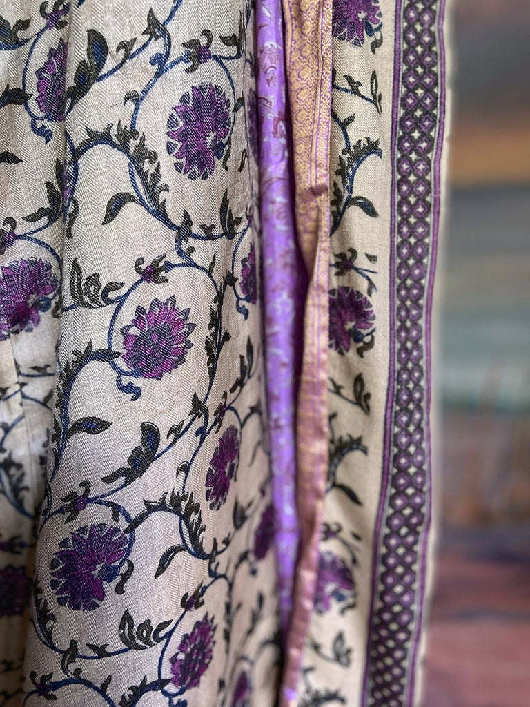 Pale lavender and lilac fine wool robe with silk lining. Wide sleeves, pockets , and tassel sash. Sustainably created from antique and vintage textiles by the Pavilion Parade studio