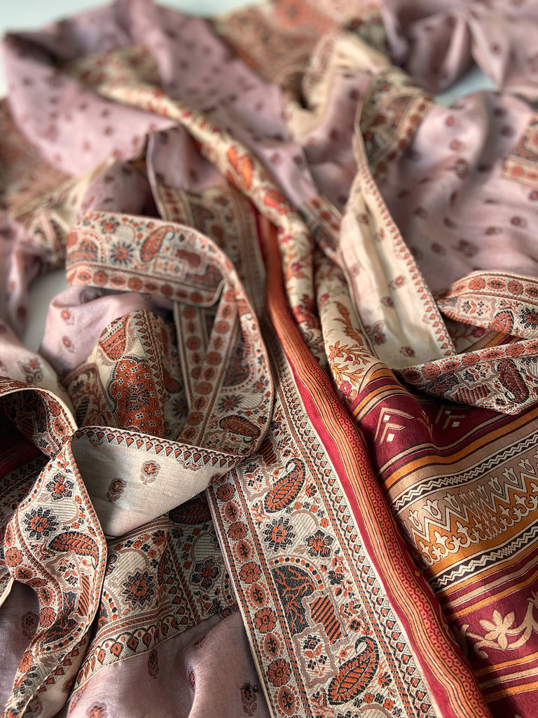 Pale lavender, ivory, and burnt orange silk robe with wide sleeves, tassel sash, and deep pockets. Unique bohemian styles sustainably created from vintage textiles by the Pavilion Parade studio.