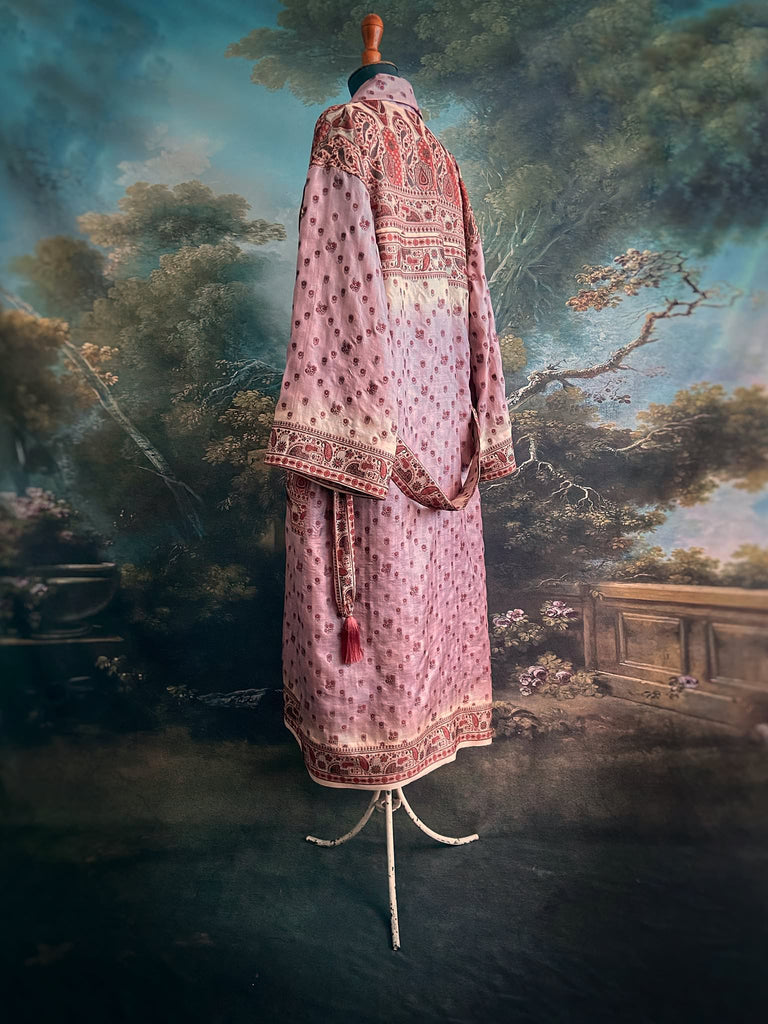 Pale lavender, ivory, and burnt orange silk robe with wide sleeves, tassel sash, and deep pockets. Unique bohemian styles sustainably created from vintage textiles by the Pavilion Parade studio.
