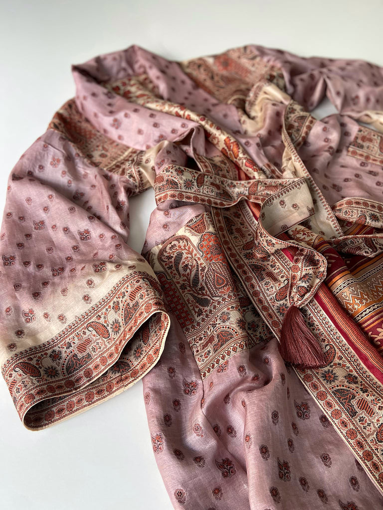 Pale lavender, ivory, and burnt orange silk robe with wide sleeves, tassel sash, and deep pockets. Unique bohemian styles sustainably created from vintage textiles by the Pavilion Parade studio.