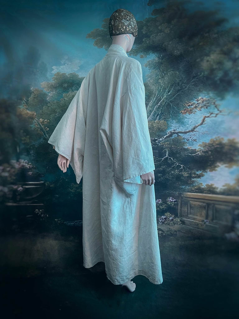 Full length kimono inspired robe with large patch pockets. Newly created from a bolt of deadstock early 20th century antique French flax linen. All French seamed with hand finished hems and collar. Bohemian styles sustainably created from antique and vintage textiles by the Pavilion Parade studio.