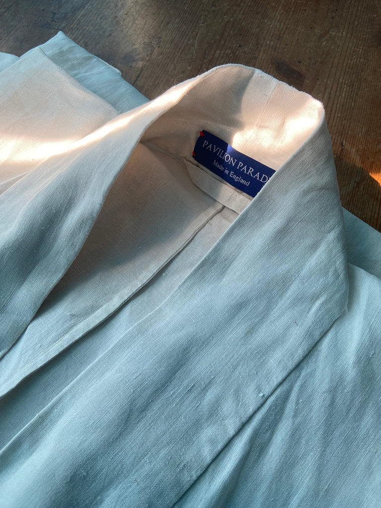 Full length kimono inspired robe with large patch pockets. Newly created from a bolt of deadstock early 20th century antique French flax linen. All French seamed with hand finished hems and collar. Bohemian styles sustainably created from antique and vintage textiles by the Pavilion Parade studio.