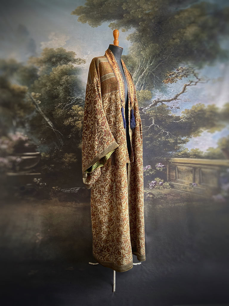 Full length 1920s inspired kimono robe with large patch pockets. Newly created from a rust, olive green and sage vintage silk crepe. Fully lined in silk with French seams throughout. Bohemian styles sustainably created from antique and vintage textiles by the Pavilion Parade studio.