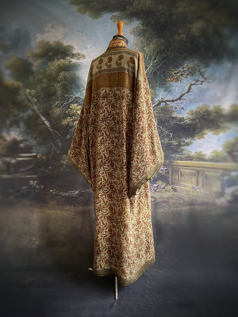 Full length 1920s inspired kimono robe with large patch pockets. Newly created from a rust, olive green and sage vintage silk crepe. Fully lined in silk with French seams throughout. Bohemian styles sustainably created from antique and vintage textiles by the Pavilion Parade studio.