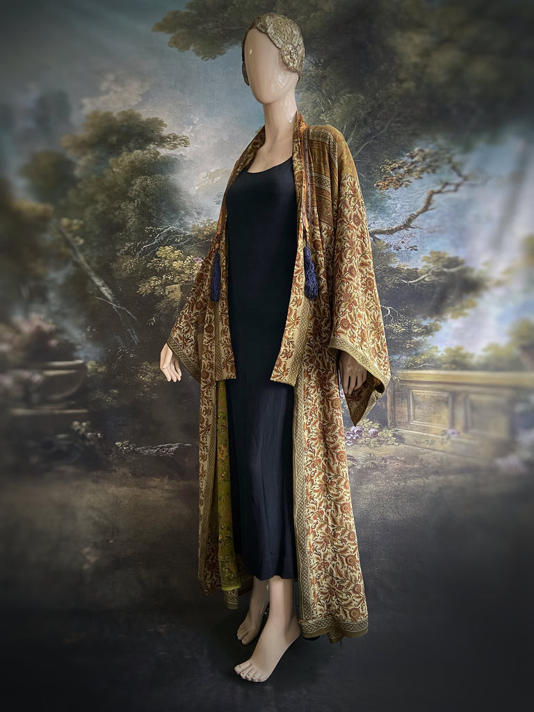 Full length 1920s inspired kimono robe with large patch pockets. Newly created from a rust, olive green and sage vintage silk crepe. Fully lined in silk with French seams throughout. Bohemian styles sustainably created from antique and vintage textiles by the Pavilion Parade studio.