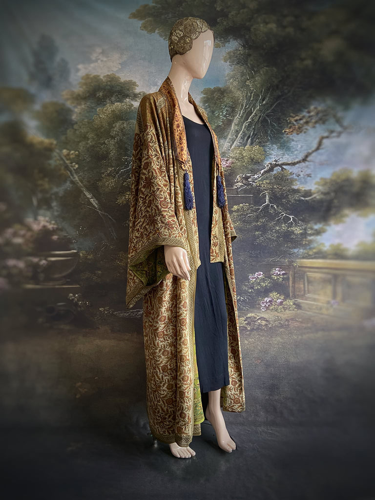 Full length 1920s inspired kimono robe with large patch pockets. Newly created from a rust, olive green and sage vintage silk crepe. Fully lined in silk with French seams throughout. Bohemian styles sustainably created from antique and vintage textiles by the Pavilion Parade studio.