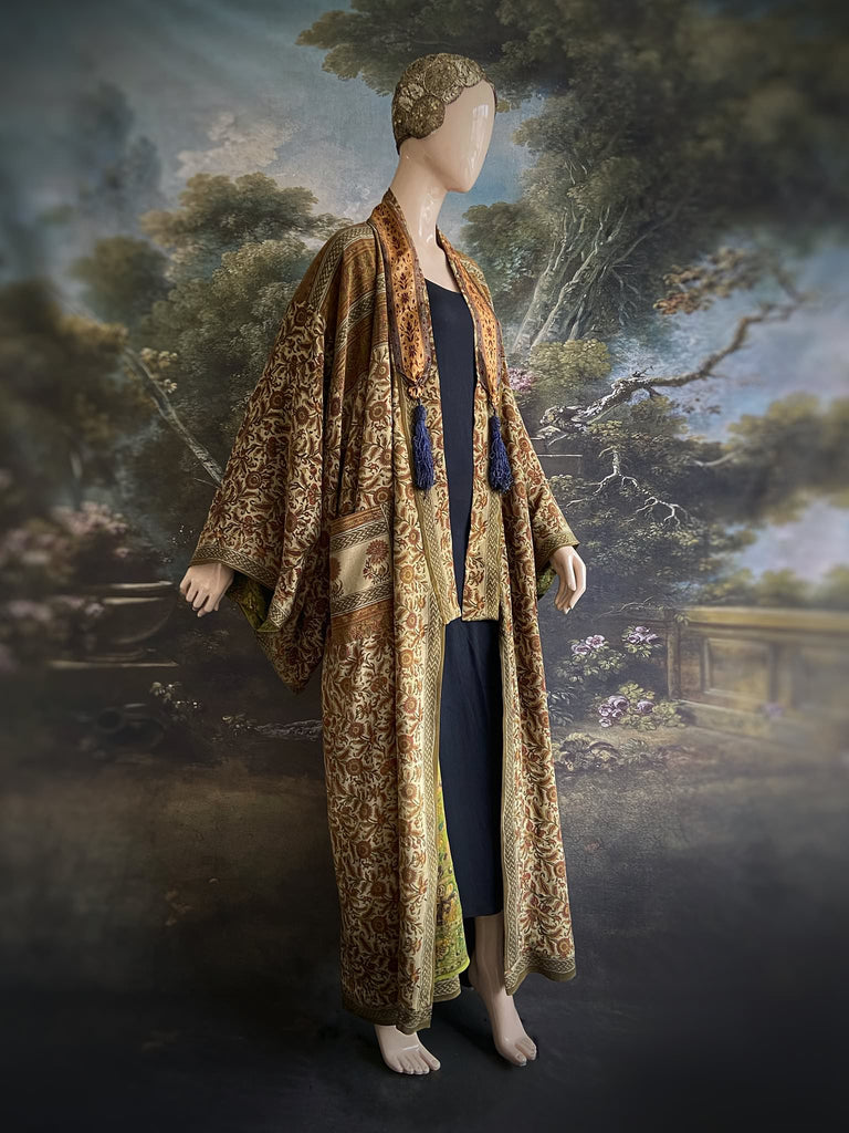 Full length 1920s inspired kimono robe with large patch pockets. Newly created from a rust, olive green and sage vintage silk crepe. Fully lined in silk with French seams throughout. Bohemian styles sustainably created from antique and vintage textiles by the Pavilion Parade studio.