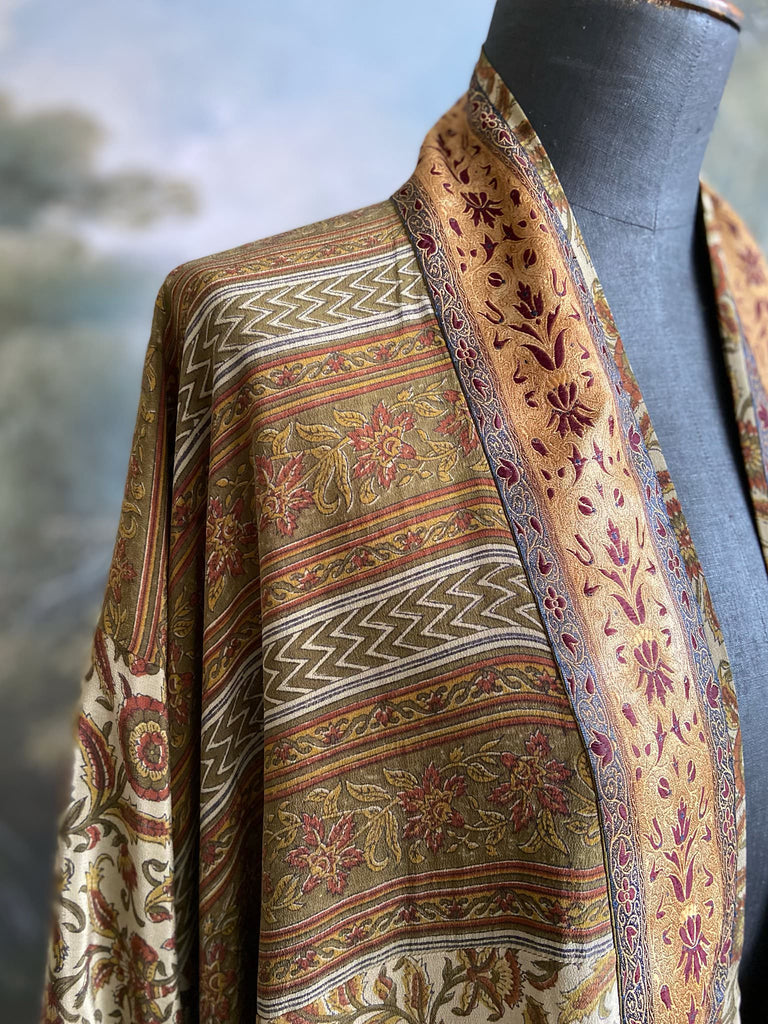 Full length 1920s inspired kimono robe with large patch pockets. Newly created from a rust, olive green and sage vintage silk crepe. Fully lined in silk with French seams throughout. Bohemian styles sustainably created from antique and vintage textiles by the Pavilion Parade studio.