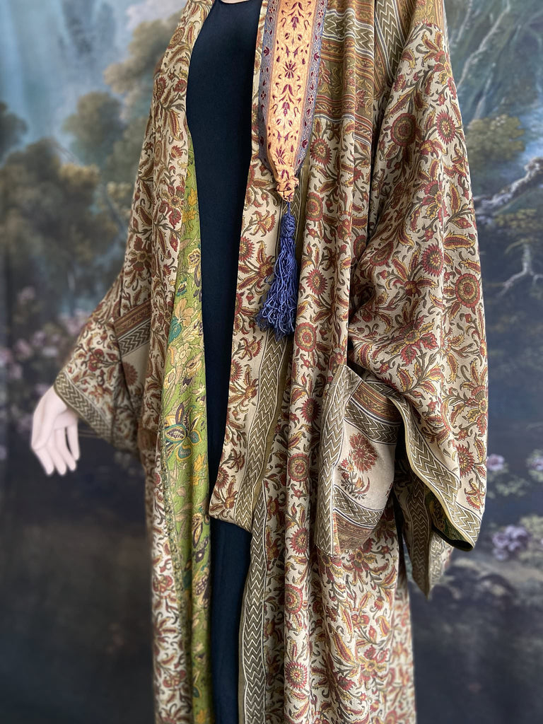 Full length 1920s inspired kimono robe with large patch pockets. Newly created from a rust, olive green and sage vintage silk crepe. Fully lined in silk with French seams throughout. Bohemian styles sustainably created from antique and vintage textiles by the Pavilion Parade studio.
