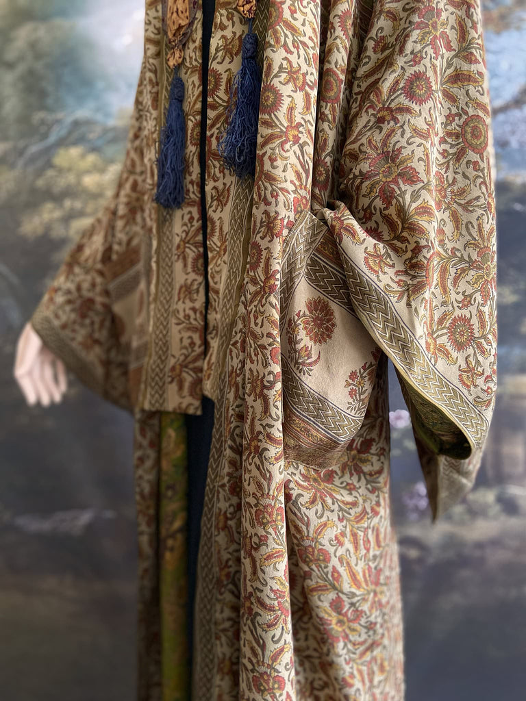 Full length 1920s inspired kimono robe with large patch pockets. Newly created from a rust, olive green and sage vintage silk crepe. Fully lined in silk with French seams throughout. Bohemian styles sustainably created from antique and vintage textiles by the Pavilion Parade studio.