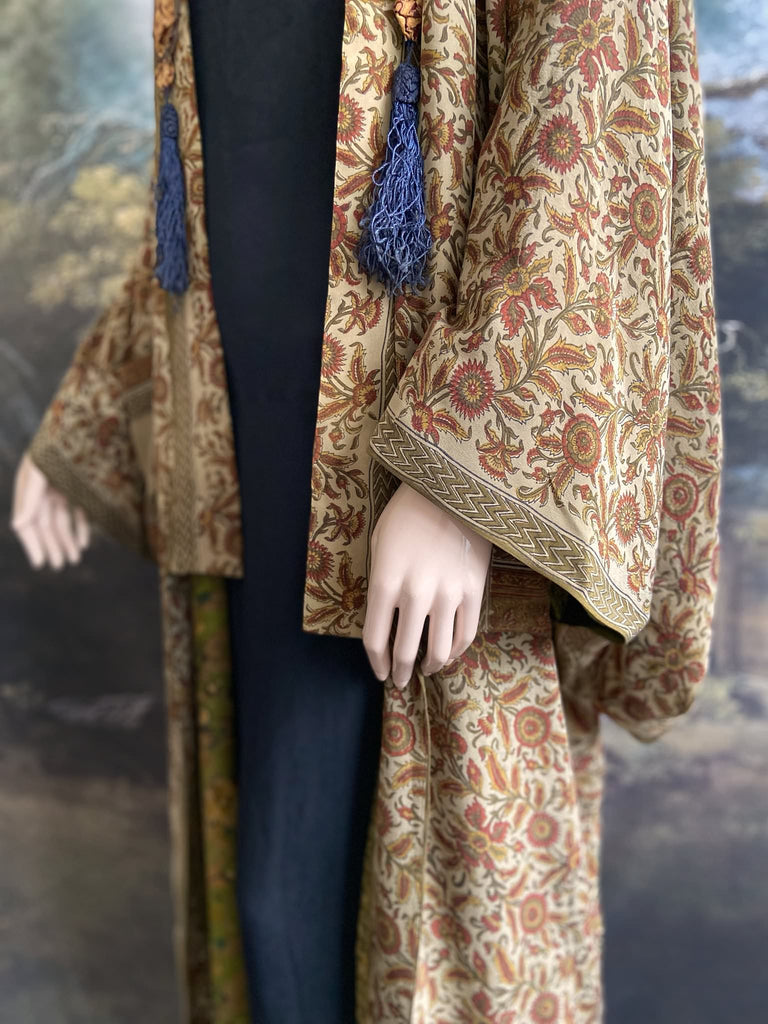 Full length 1920s inspired kimono robe with large patch pockets. Newly created from a rust, olive green and sage vintage silk crepe. Fully lined in silk with French seams throughout. Bohemian styles sustainably created from antique and vintage textiles by the Pavilion Parade studio.