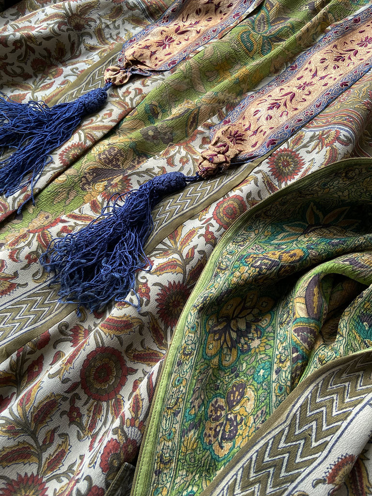 Full length 1920s inspired kimono robe with large patch pockets. Newly created from a rust, olive green and sage vintage silk crepe. Fully lined in silk with French seams throughout. Bohemian styles sustainably created from antique and vintage textiles by the Pavilion Parade studio.