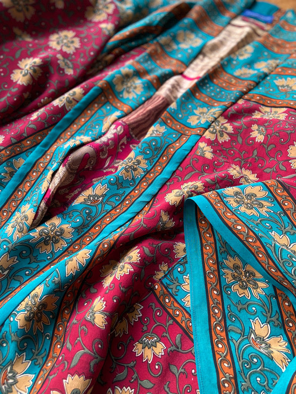 1920s inspired silk kimono robe created from vintage teal, ochre and carmine red silk crepe. Unique bohemian designs from the Pavilion Parade studio.