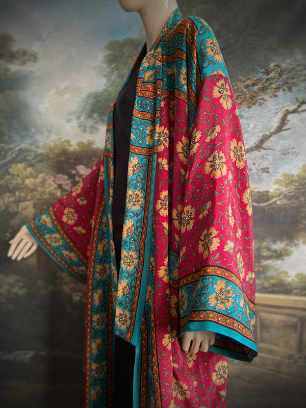 1920s inspired silk kimono robe created from vintage teal, ochre and carmine red silk crepe. Unique bohemian designs from the Pavilion Parade studio.