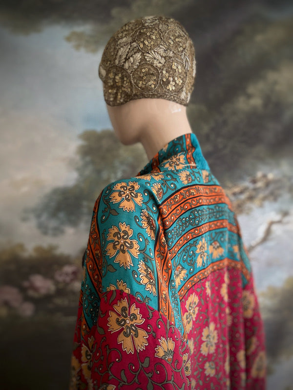 1920s inspired silk kimono robe created from vintage teal, ochre and carmine red silk crepe. Unique bohemian designs from the Pavilion Parade studio.