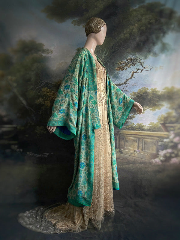 1920s inspired silk kimono robe created from vintage ivory, turquoise and sky blue silk crepe. Unique bohemian designs from the Pavilion Parade studio.
