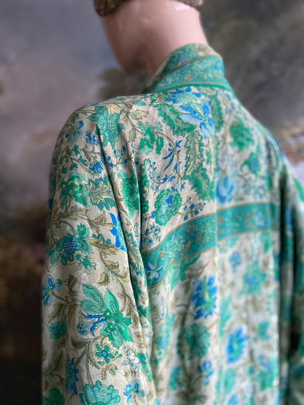 1920s inspired silk kimono robe created from vintage ivory, turquoise and sky blue silk crepe. Unique bohemian designs from the Pavilion Parade studio.