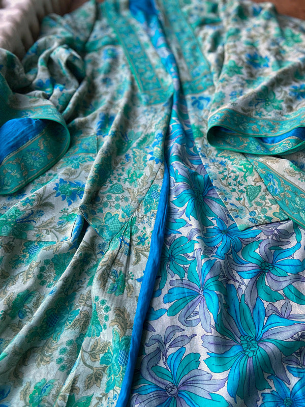 1920s inspired silk kimono robe created from vintage ivory, turquoise and sky blue silk crepe. Unique bohemian designs from the Pavilion Parade studio.