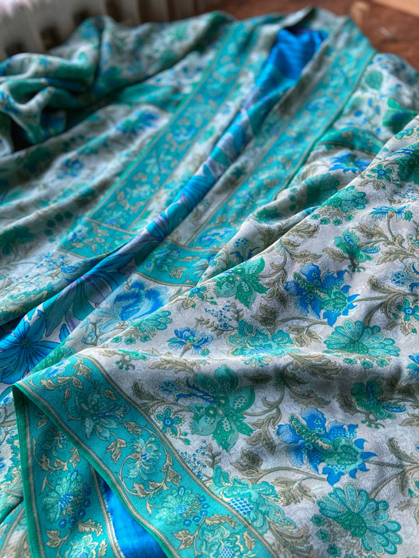 1920s inspired silk kimono robe created from vintage ivory, turquoise and sky blue silk crepe. Unique bohemian designs from the Pavilion Parade studio.