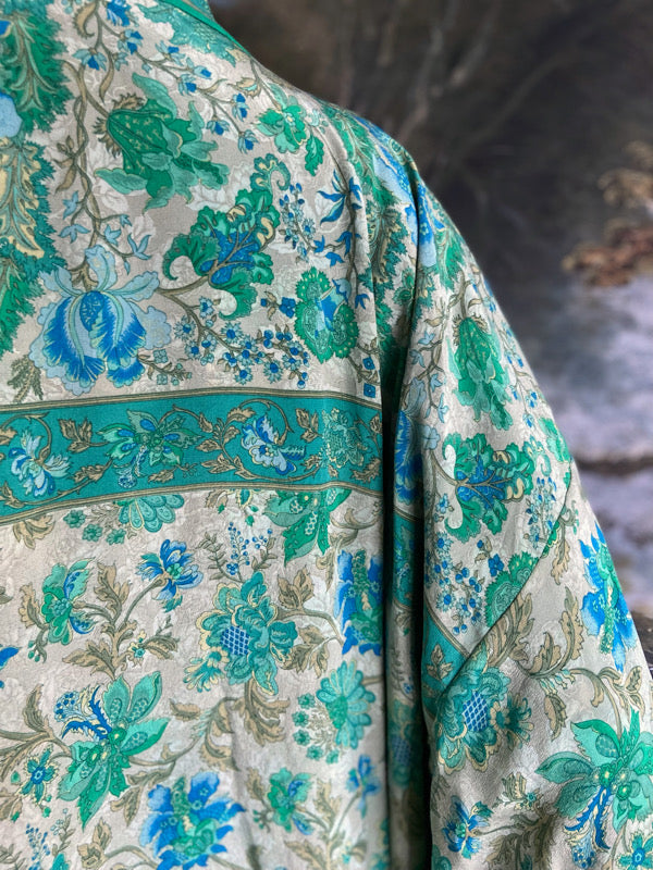 1920s inspired silk kimono robe created from vintage ivory, turquoise and sky blue silk crepe. Unique bohemian designs from the Pavilion Parade studio.