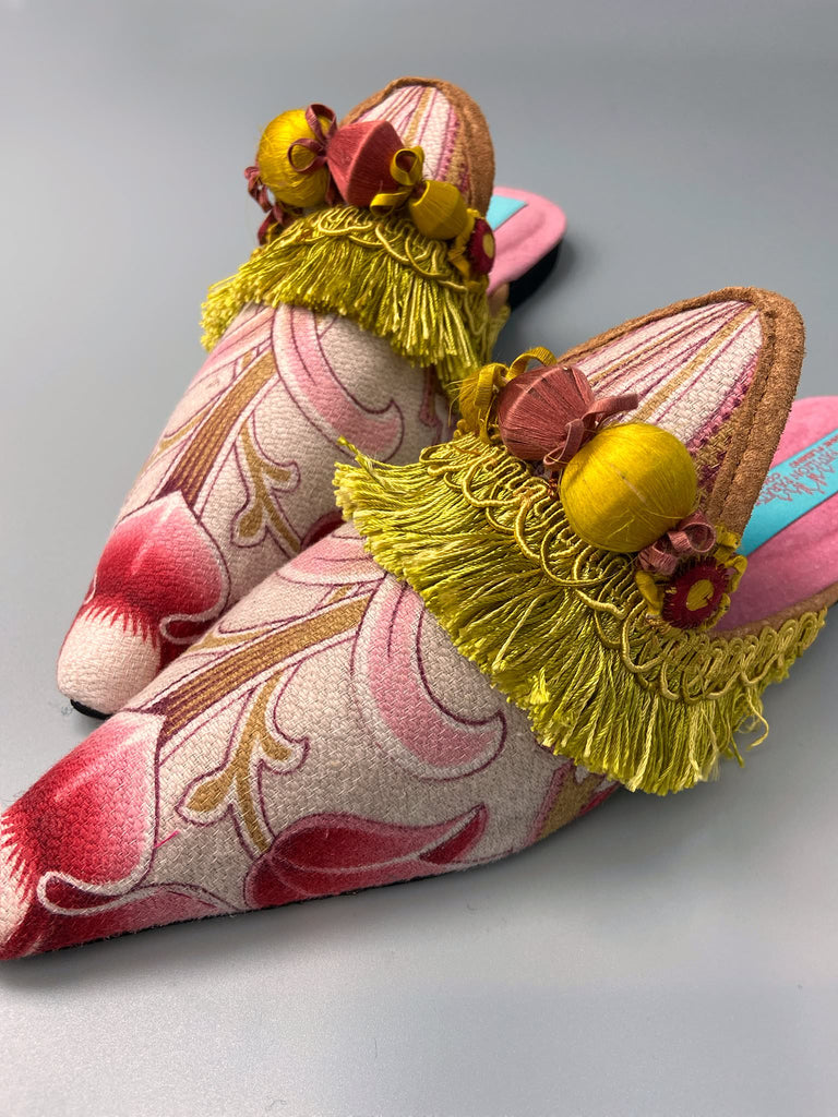 Copper pink and chartreuse Belle Époque pointed toe slipper shoes with chartreuse tassel embellishment. Bohemian styles created from antique textiles by the Pavilion Parade studio.