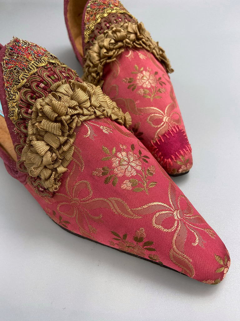Deep rose pink and gold silk brocade pointed toe shoes sustainably created using antique textiles and embellishments by the Pavilion Parade studio.