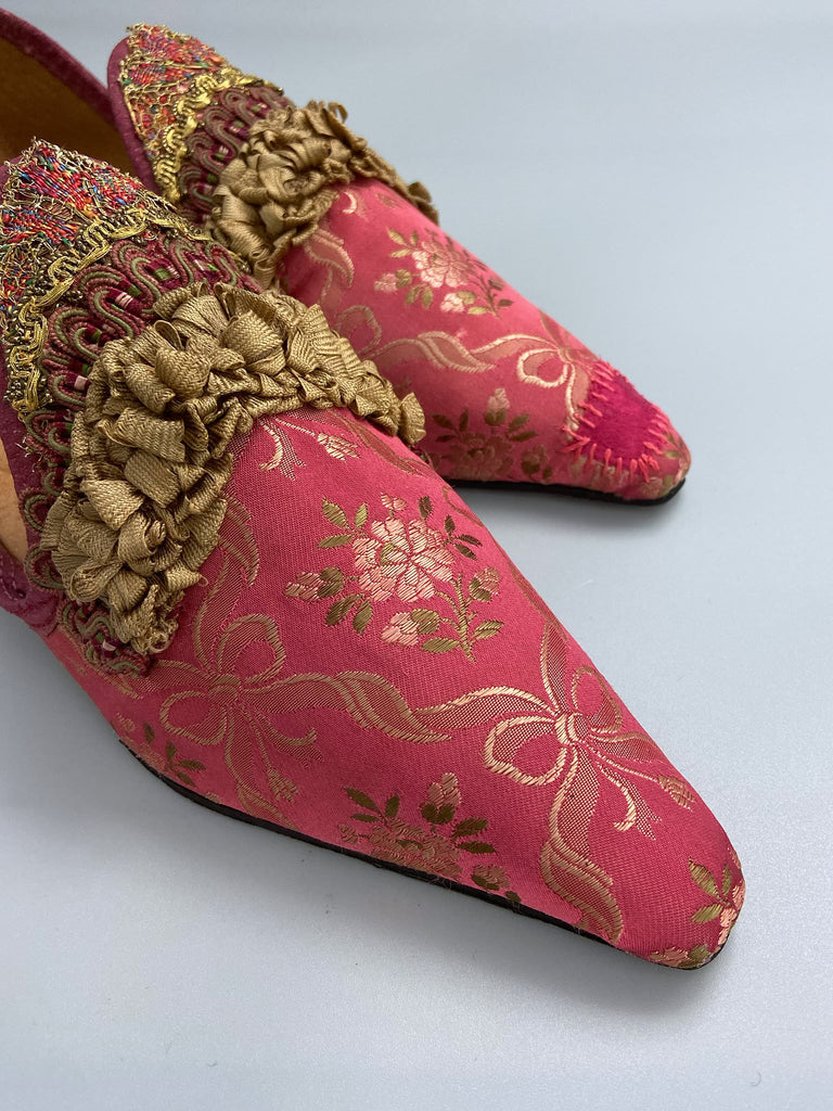 Deep rose pink and gold silk brocade pointed toe shoes sustainably created using antique textiles and embellishments by the Pavilion Parade studio.