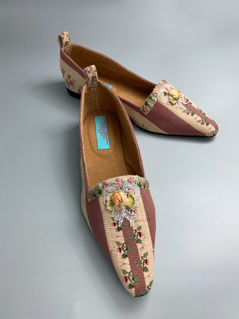 Rosebud toile pointed toe Regency dancing slippers with antique silk appliqué bows and ankle ribbons. Bohemian style created from antique and vintage textiles by Pavilion Parade.