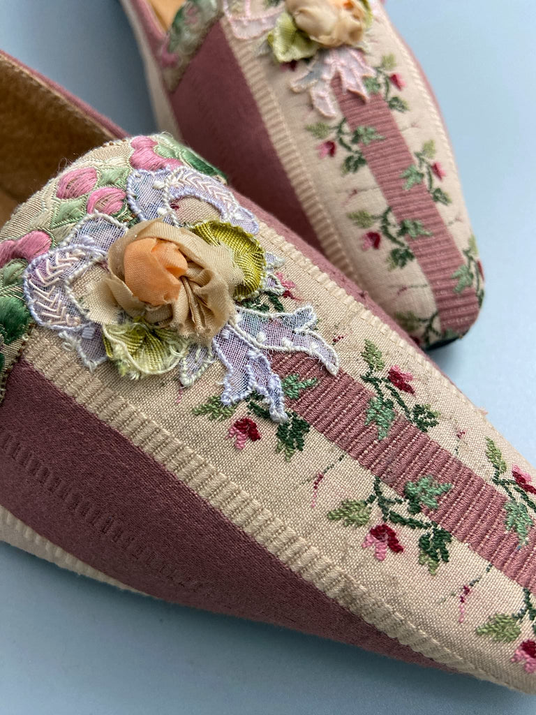 Rosebud toile pointed toe Regency dancing slippers with antique silk appliqué bows and ankle ribbons. Bohemian style created from antique and vintage textiles by Pavilion Parade.