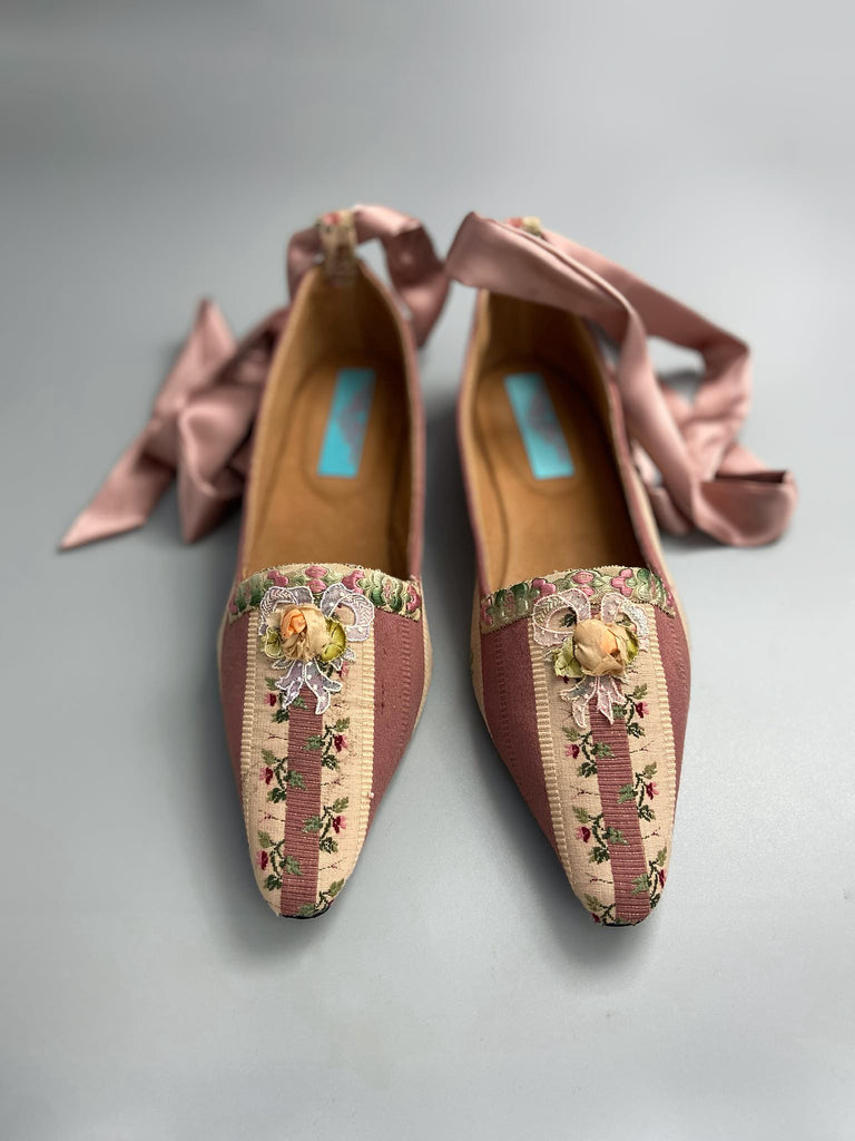 Rosebud toile pointed toe Regency dancing slippers with antique silk appliqué bows and ankle ribbons. Bohemian style created from antique and vintage textiles by Pavilion Parade.