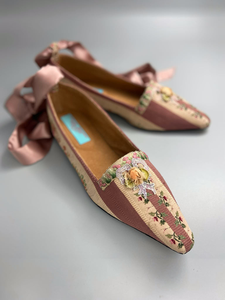 Rosebud toile pointed toe Regency dancing slippers with antique silk appliqué bows and ankle ribbons. Bohemian style created from antique and vintage textiles by Pavilion Parade.